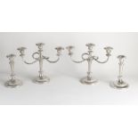 Four plated candlesticks