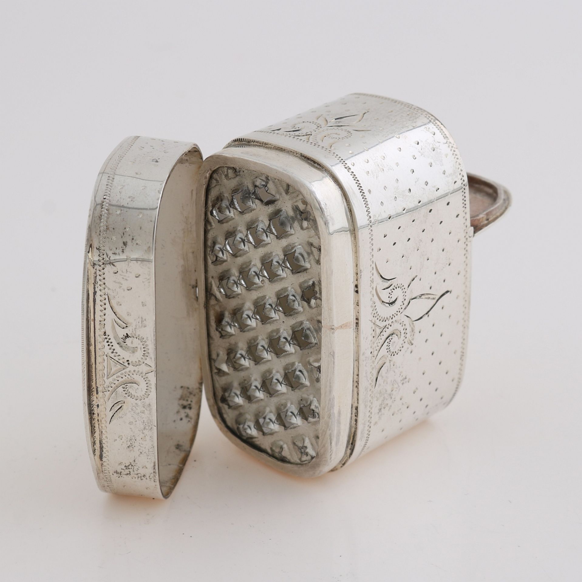 Silver nutmeg grater