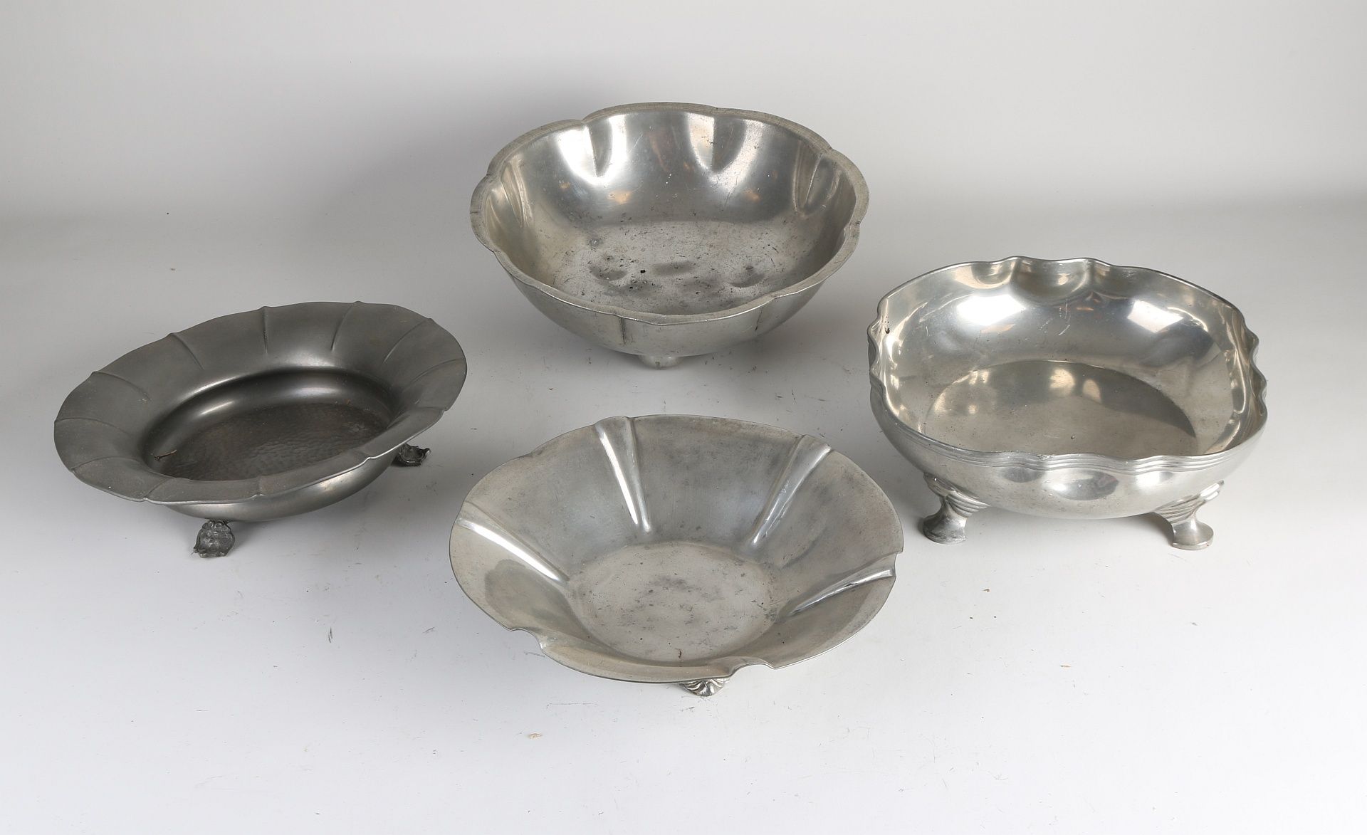 Four pewter bowls