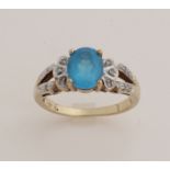 Ring with diamond and blue topaz.
