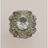 Silver ring with colored stones