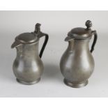 Two pewter pitchers