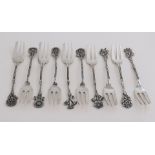 Ten silver pastry forks