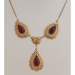 Gold choker with garnet