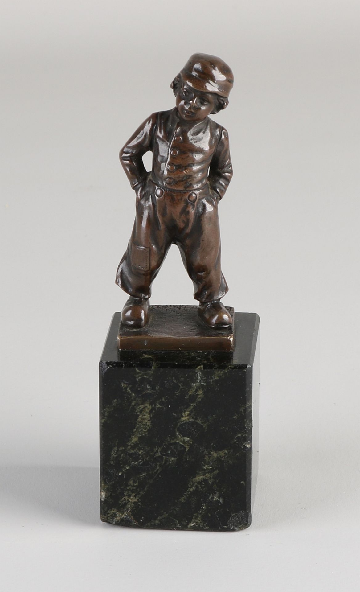 Antique bronze figure, Boy on wooden shoes