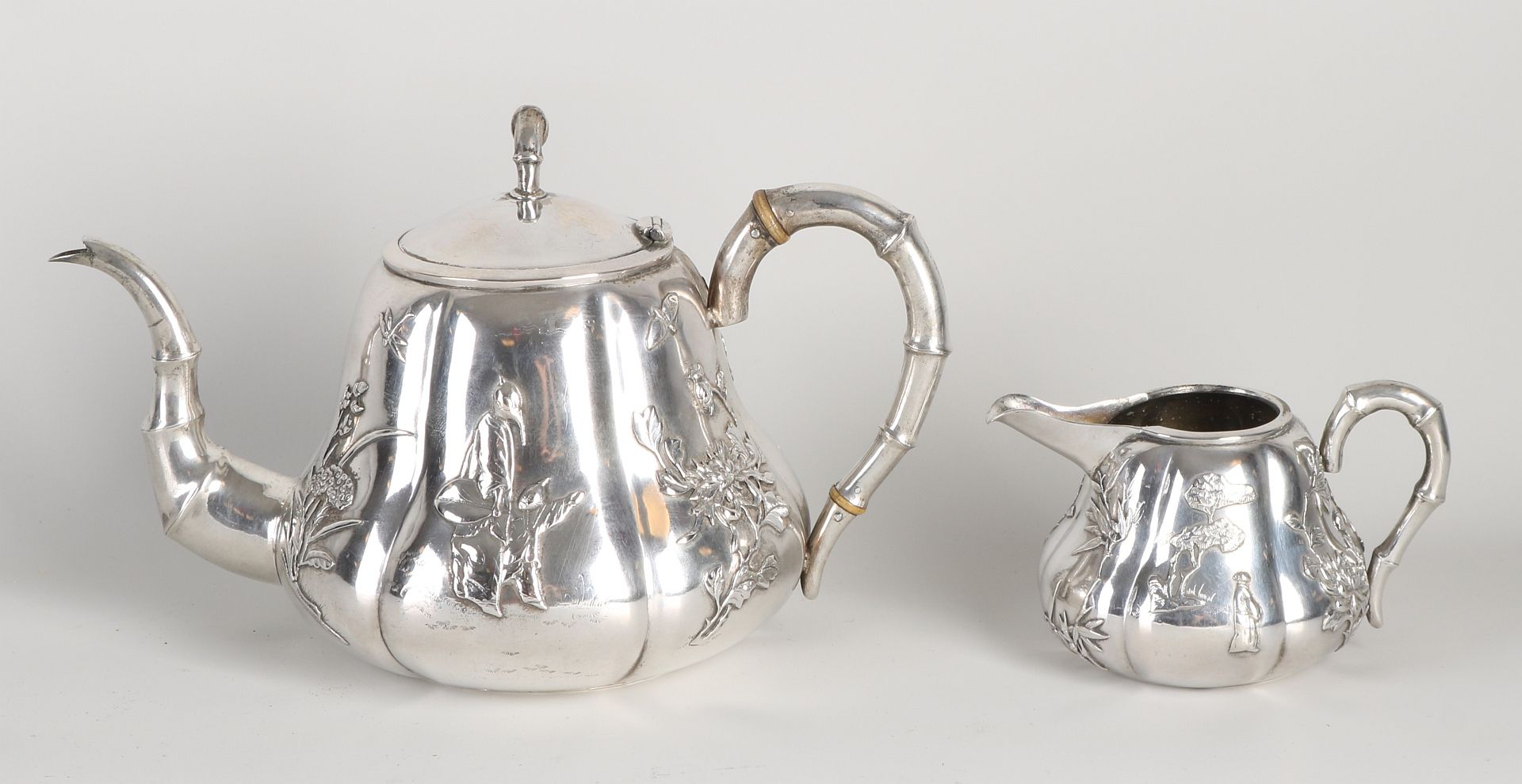Chinese silver teapot and pitcher