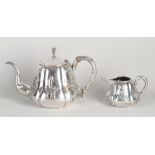 Chinese silver teapot and pitcher