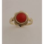 Gold ring with red coral