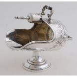 Silver sugar bowl with spoon