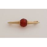 Gold brooch with carnelian