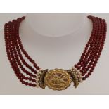 Spinel necklace with gold