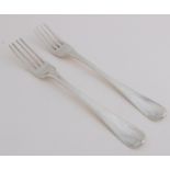 Two silver forks