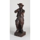 Wooden figure, Man with wind instrument