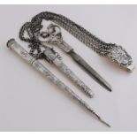 Silver chatelaine with scissors and tubes