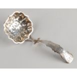 Silver sprinkle spoon