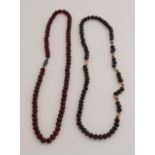 2 Necklaces with garnet.