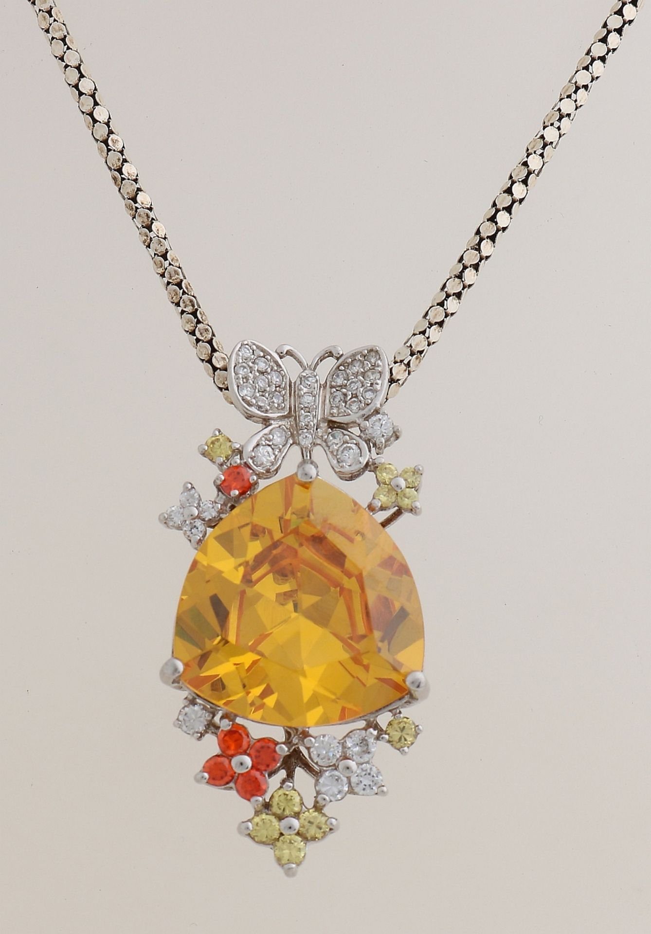 Silver necklace with pendant, yellow stone