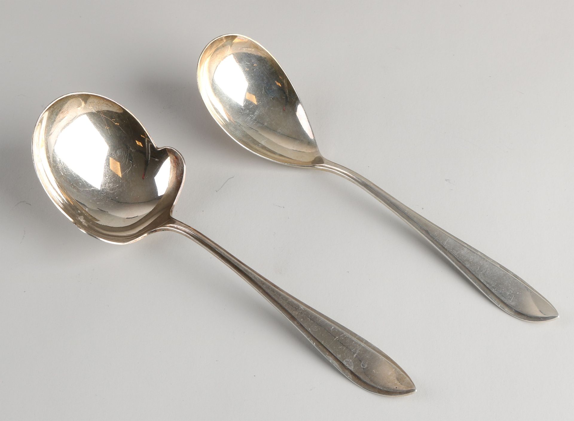 2 Silver spoons