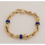Gold bracelet with lapis lazuli