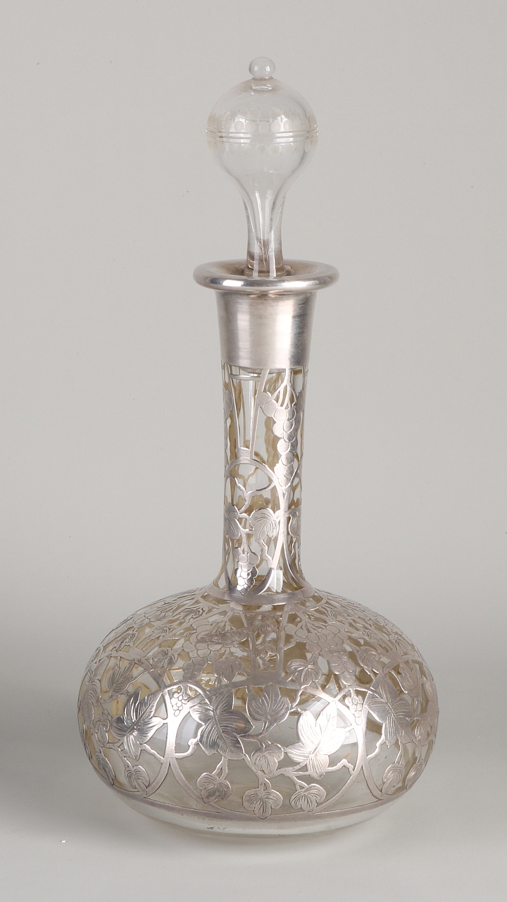 Decanter with silverware