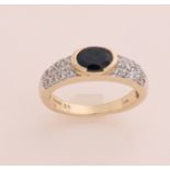 Gold ring with diamond and sapphire