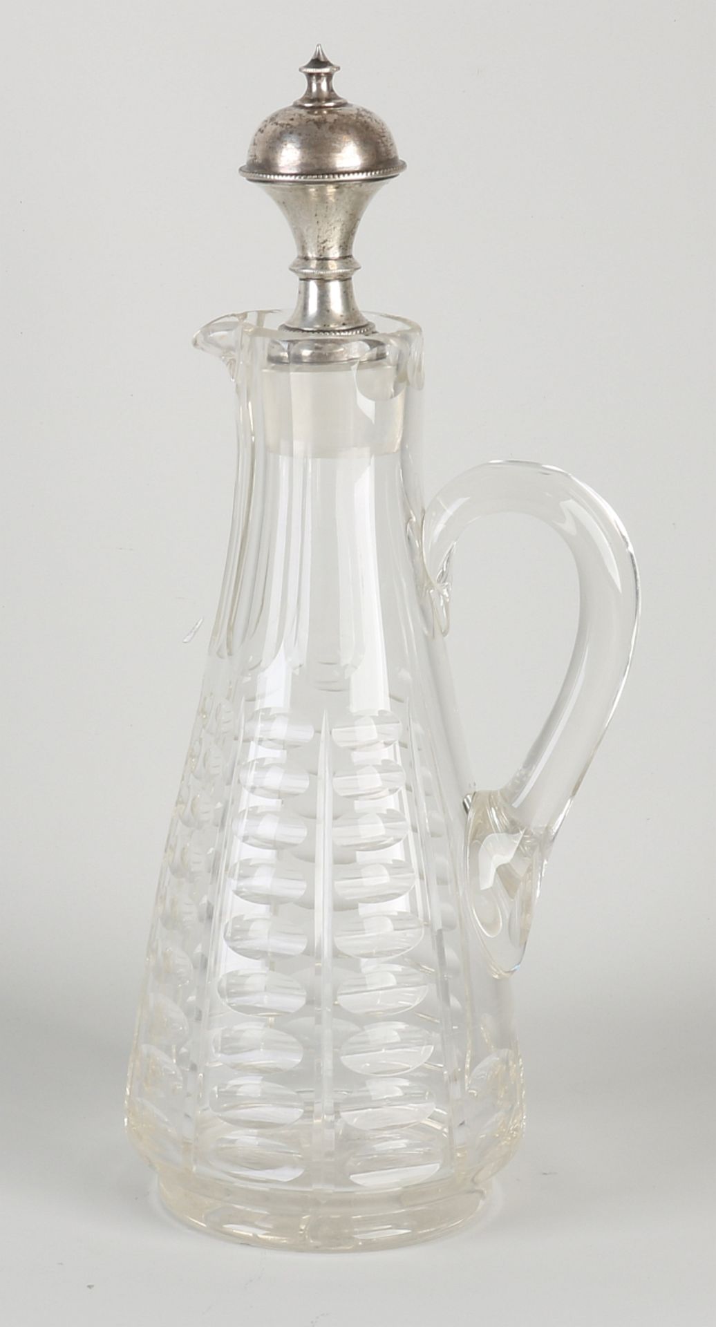 Decanter with silver stopper