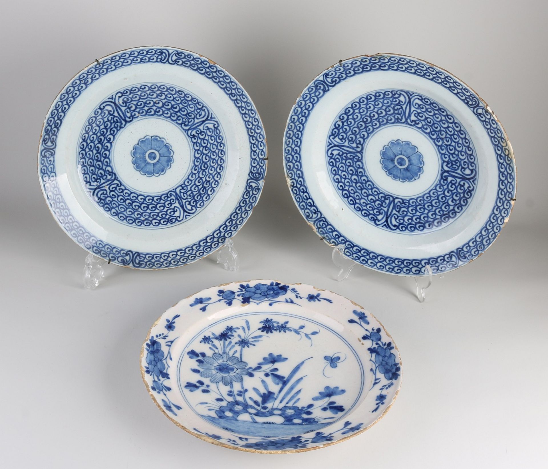 Three Delft blue plates