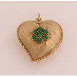 Golden heart with green stones