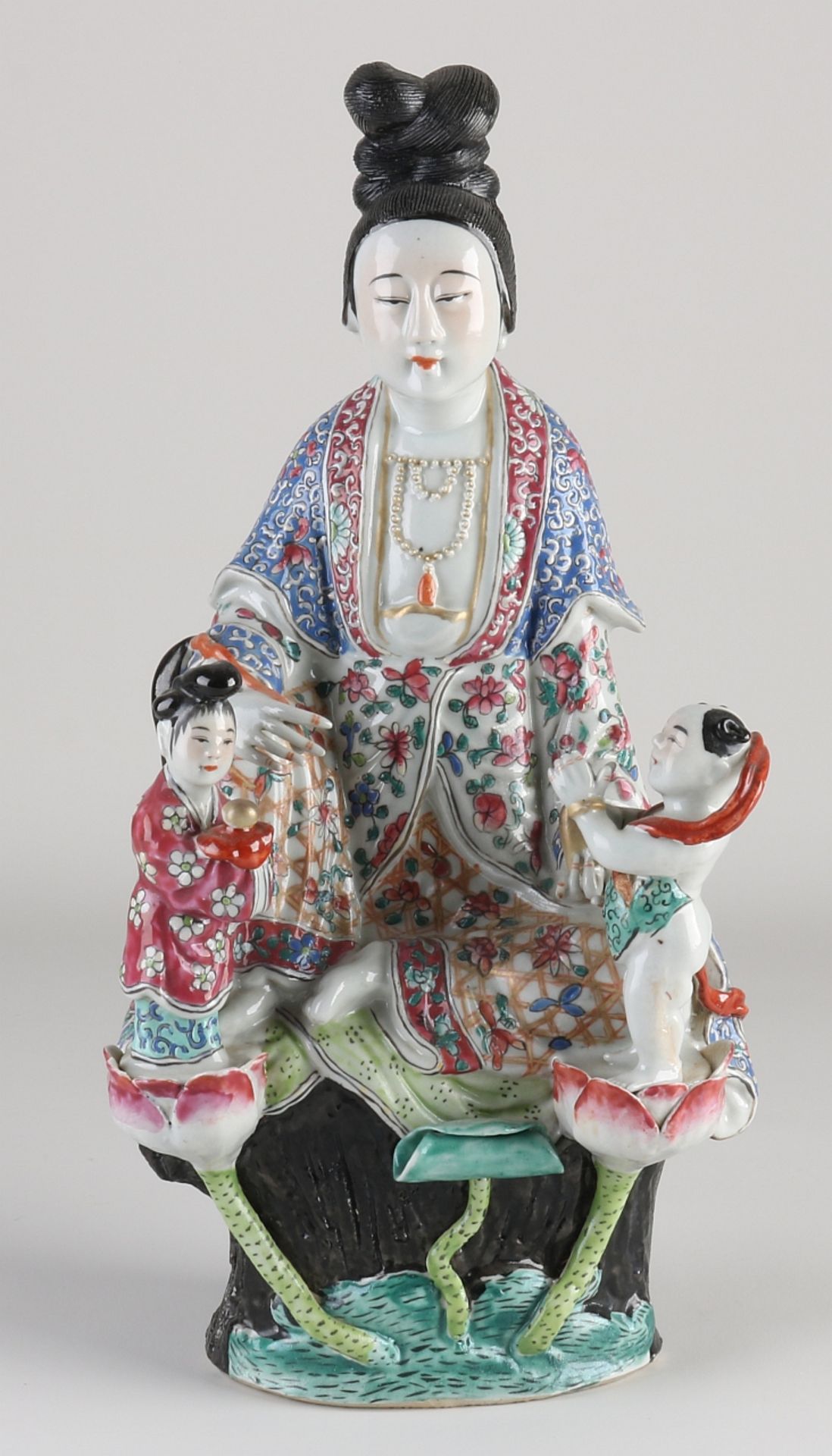 Chinese Quan Yin with children, H 33 cm.