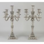 Two silver candlesticks