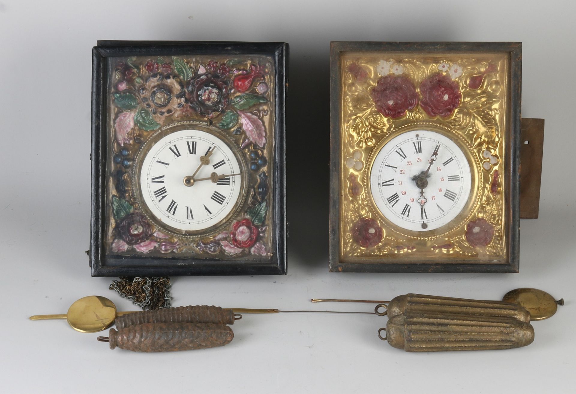 Two Schwarzwalder wall clocks