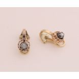 Gold earclips with diamond