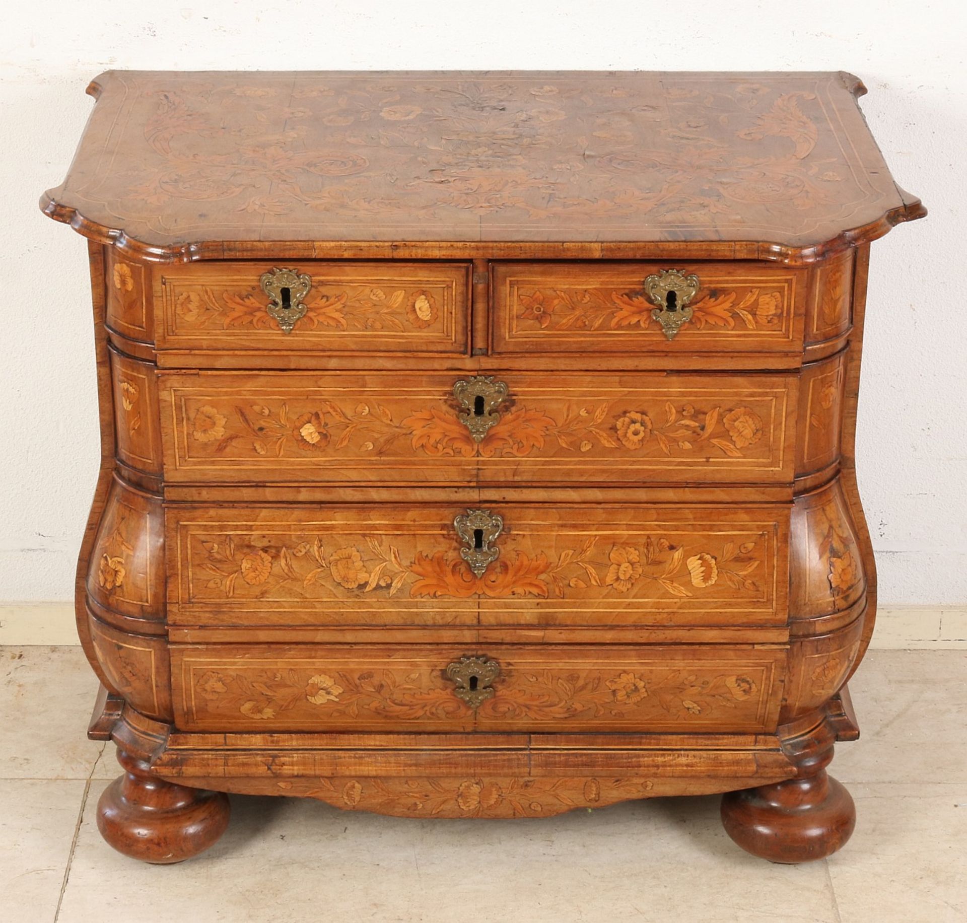 Marquetry inlaid chest of drawers