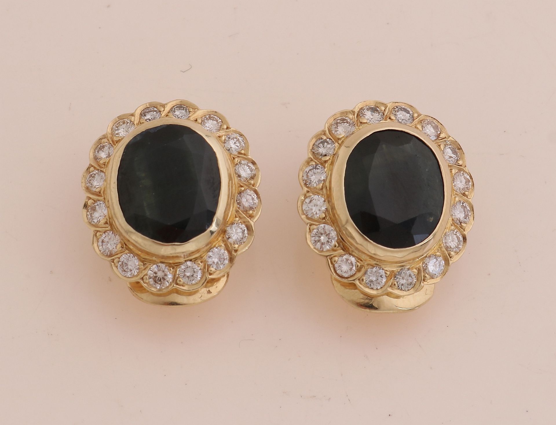 Gold ear studs with sapphire and diamond
