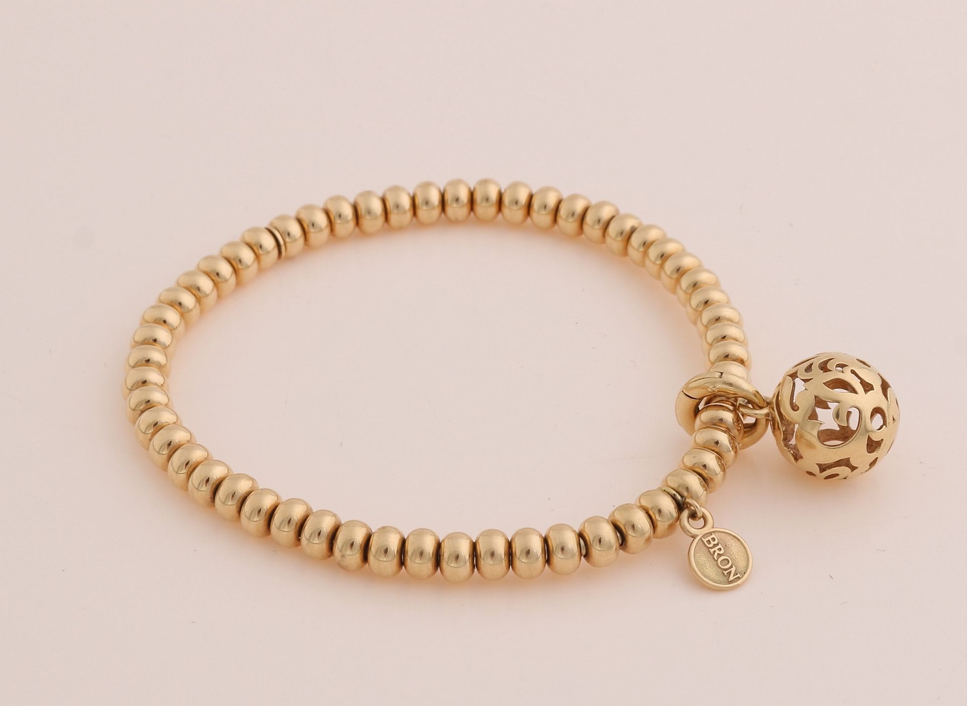 Yellow gold bracelet, sphere, with pendant