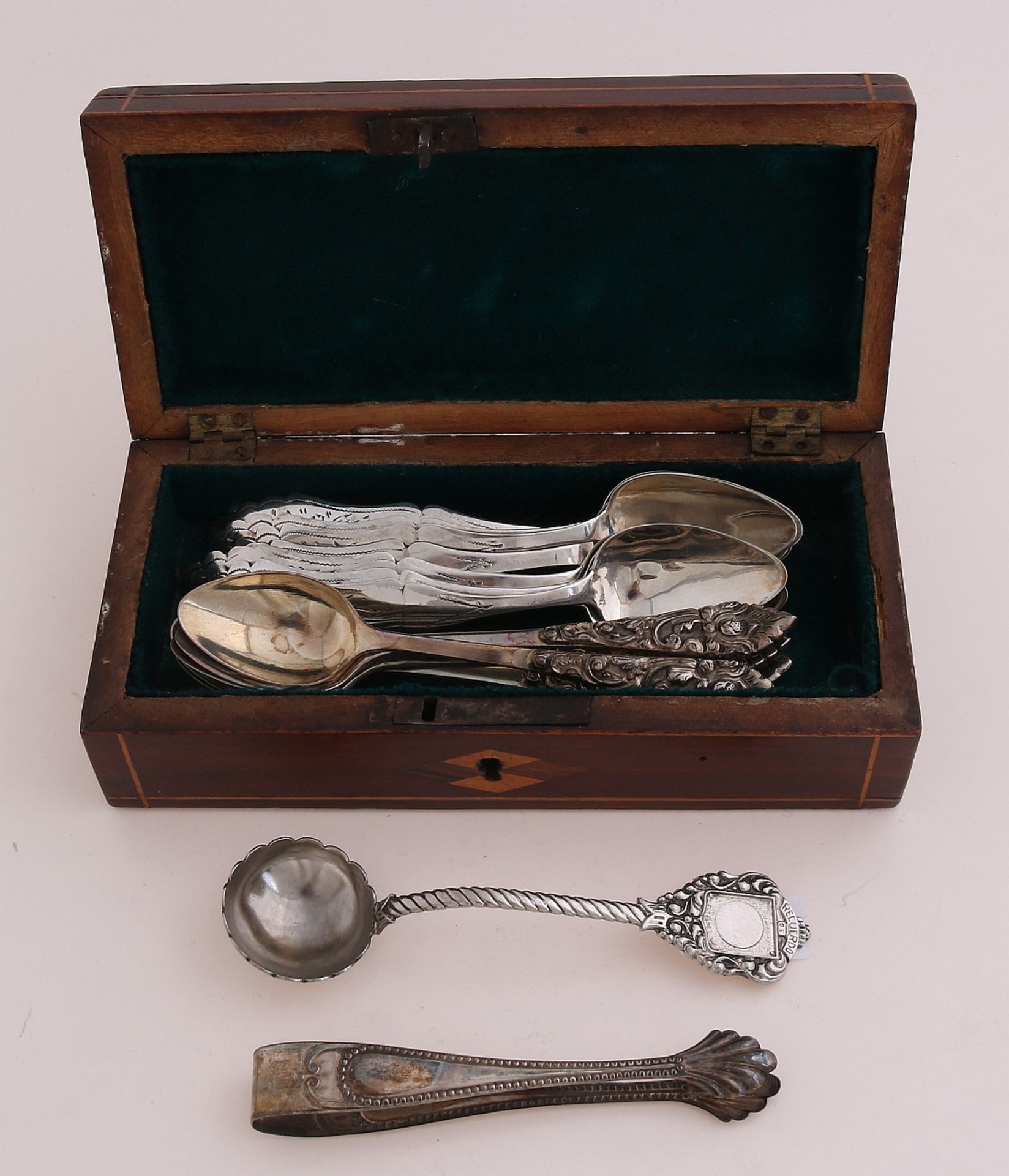 Spoon box with silver spoons