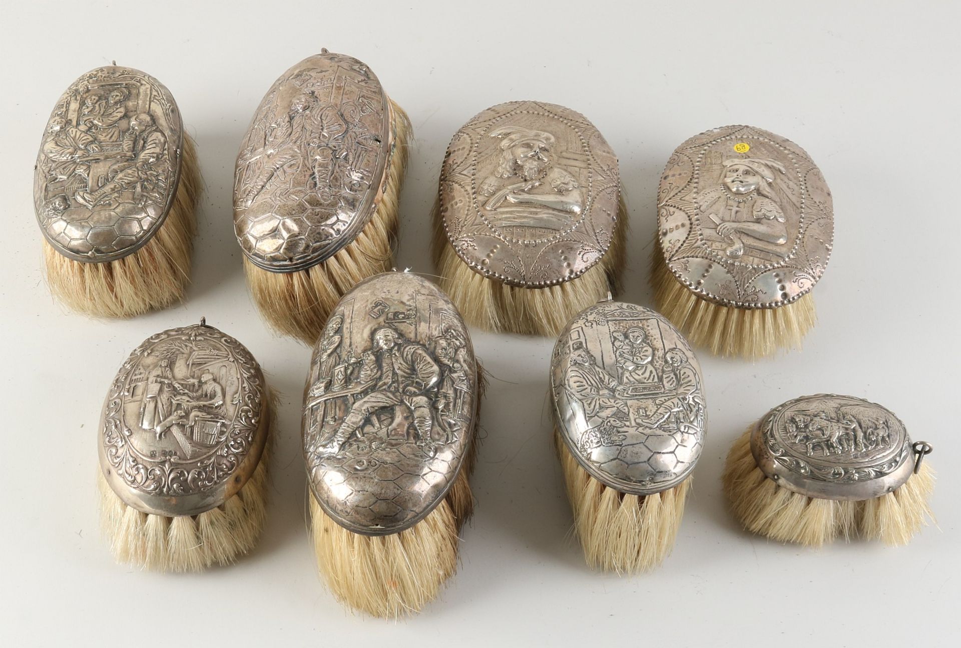Eight silver brushes