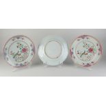 Three 18th century Family Rose plates Ø 26 cm.