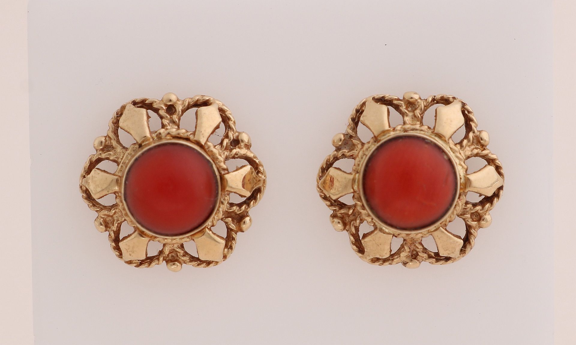 Gold ear studs with red coral