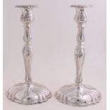 Two silver candlesticks