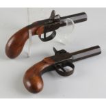 Two antique pistols
