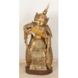 Carved oriental statue