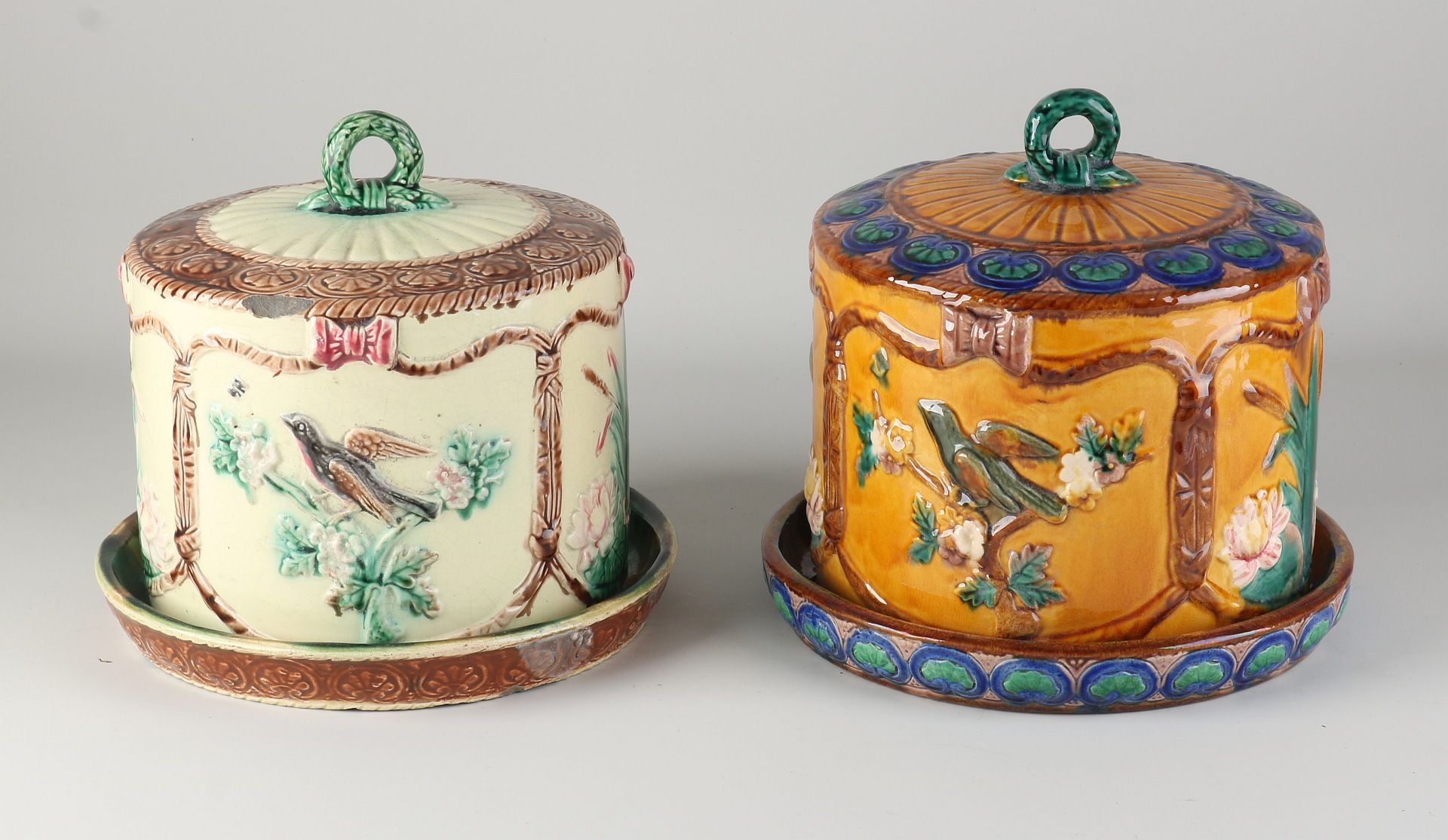 Two majolica butter dishes