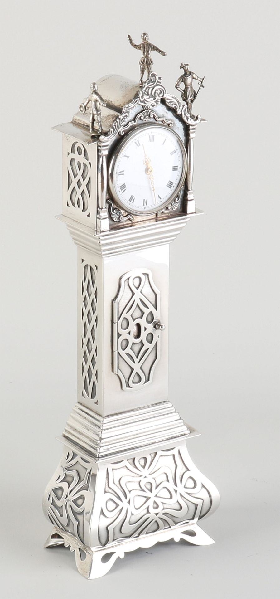 silver standing watch