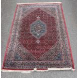 Large Persian rug, 320 x 202 cm.