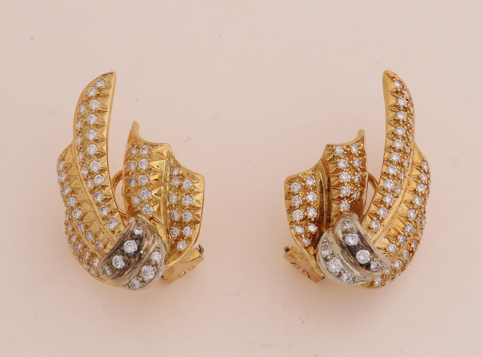 Gold ear studs with diamonds