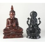 Two wooden Buddhas