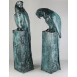 Two bronze parrots