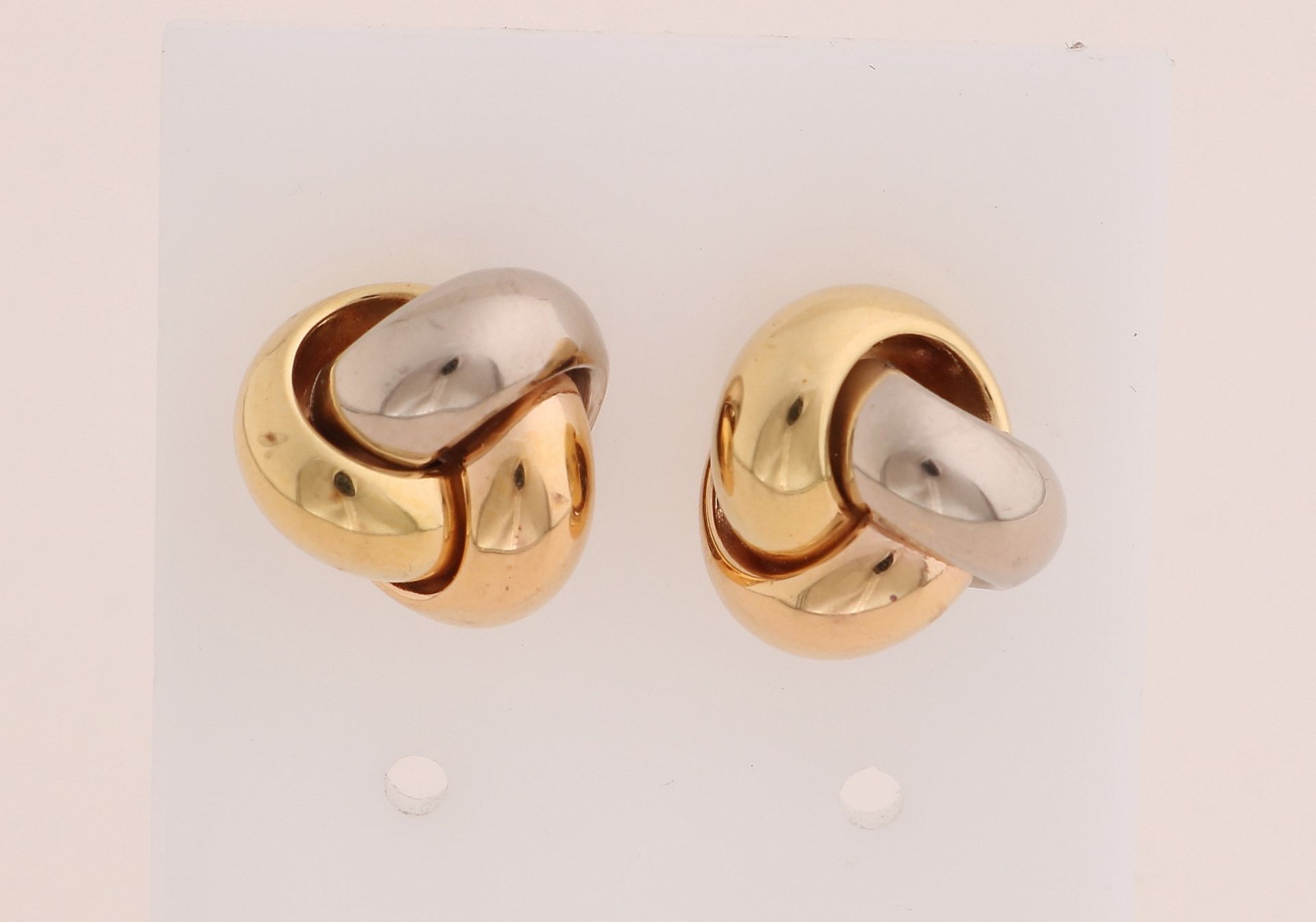 Gold tricolor ear studs, wool knot