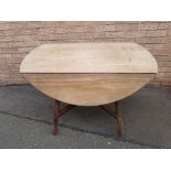 Ercol Drop Leaf Dining Table measuring 48 inches x 42 inches